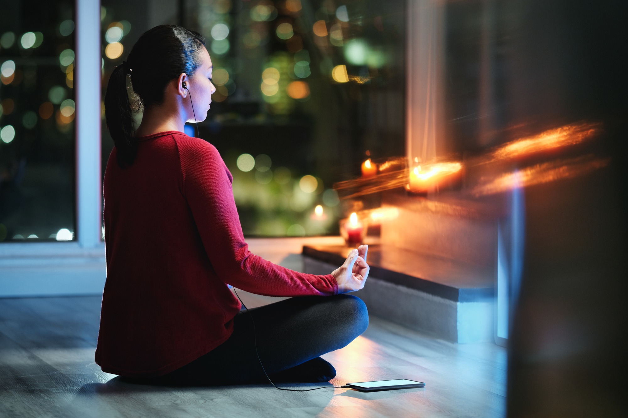 Latin American Woman Doing Yoga At Night